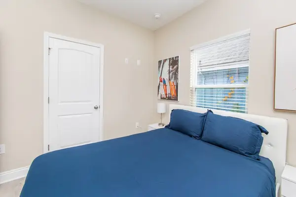 Bedroom with a double bed and plenty of natural light