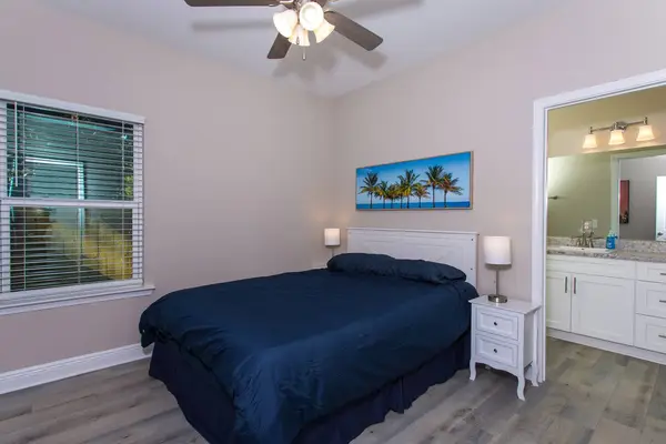 Bedroom with a double bed opening onto the bathroom