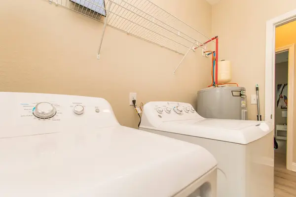 Laundry area with a full-size washer and dryer