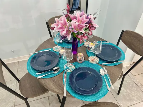 Dining table set for two