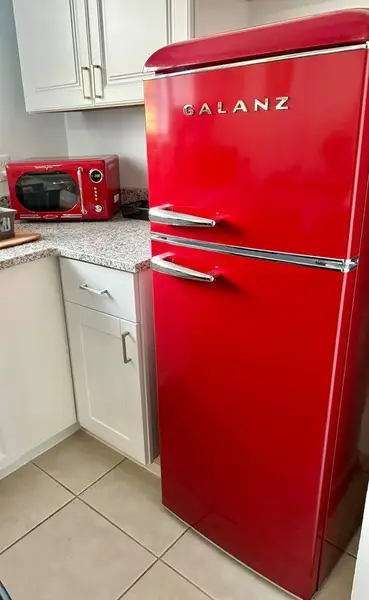 Retro red fridge in the kitchen