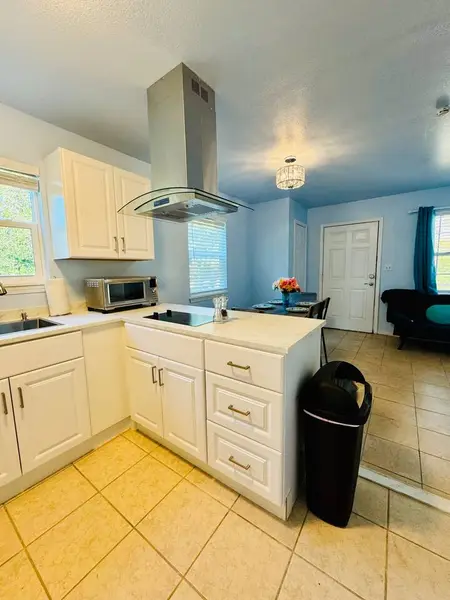 Bright kitchen with a range hood