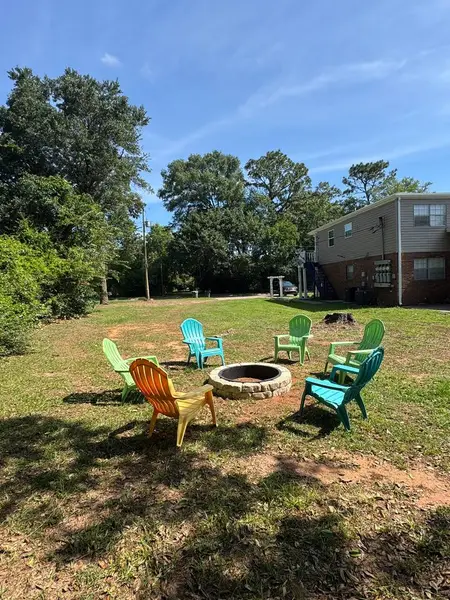 Fire pit with chairs on the shared lawn