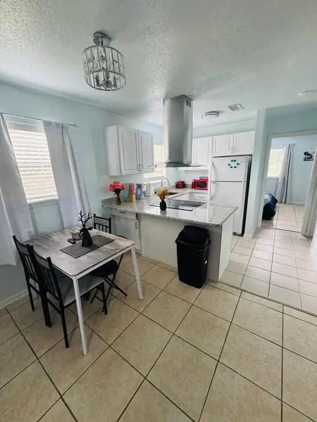 Open kitchen and dining area