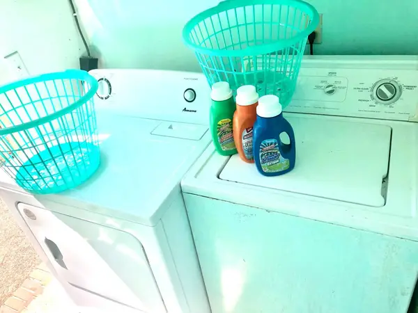 Washer and dryer with laundry baskets
