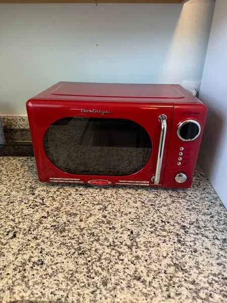 Retro red microwave on the counter
