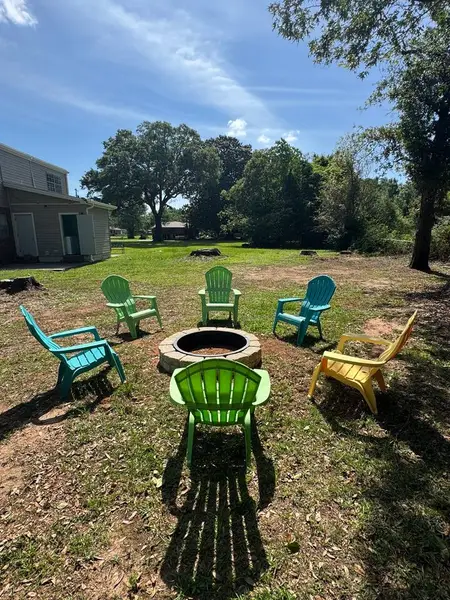Fire pit with chairs on the shared lawn