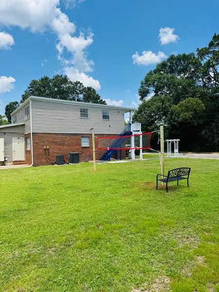 Shared lawn with a basketball hoop