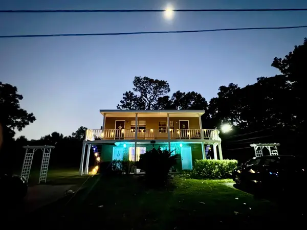 The building lit up in the evening