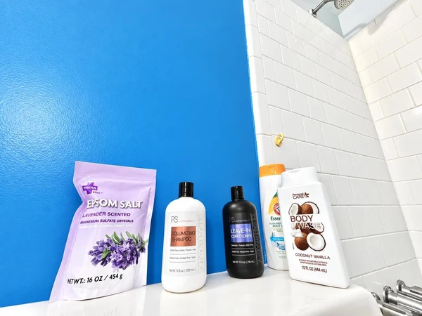 Bath salts and toiletries in the shower