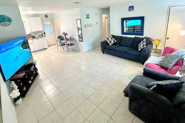 Open living and dining area seen from the entrance