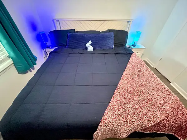 Bedroom with a king bed and bedside tables