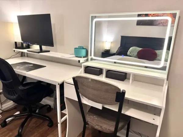 Second workspace with a monitor and lit mirror